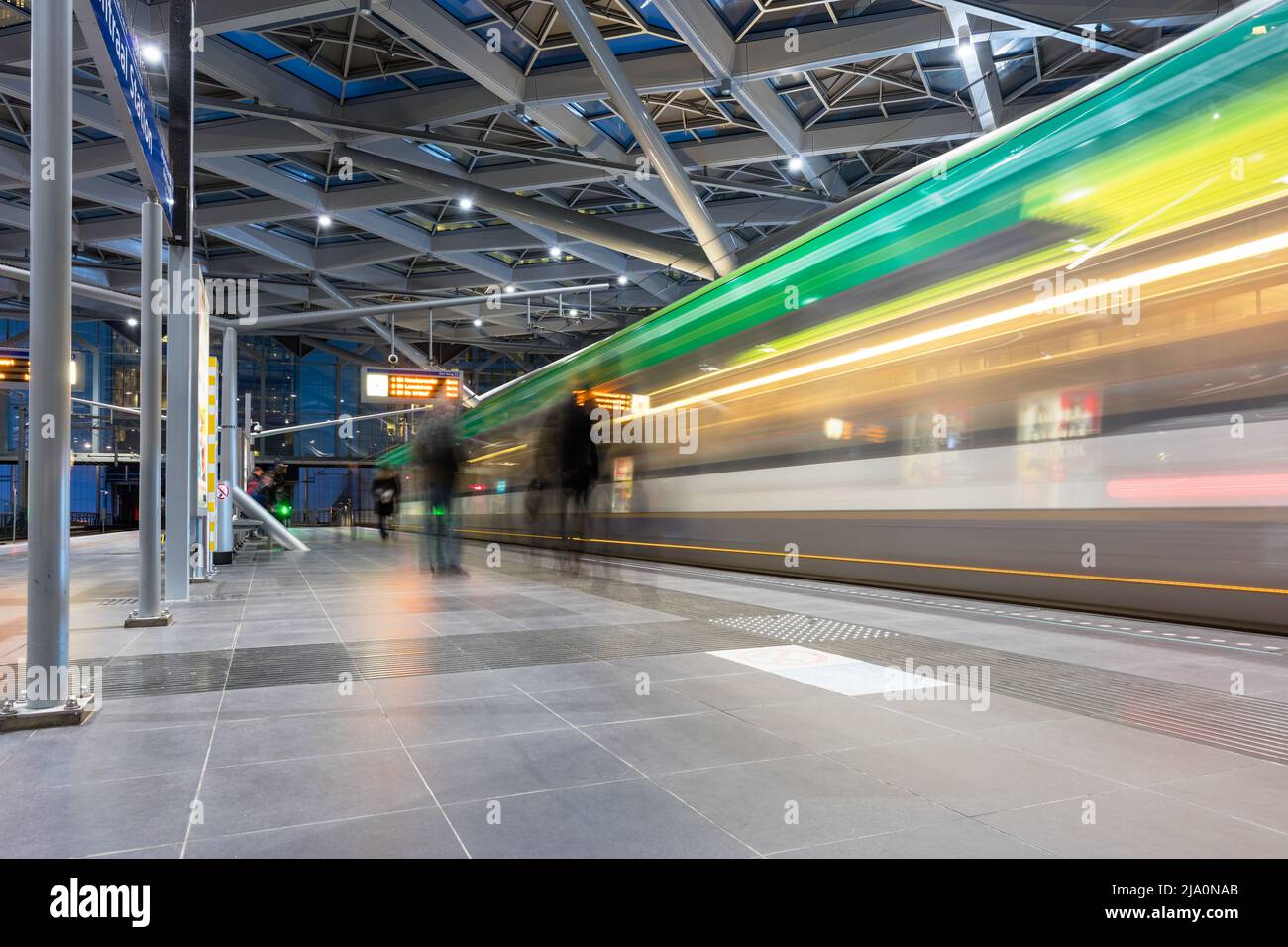 A modern tram arriving at Haag Station in Holland Stock Photo