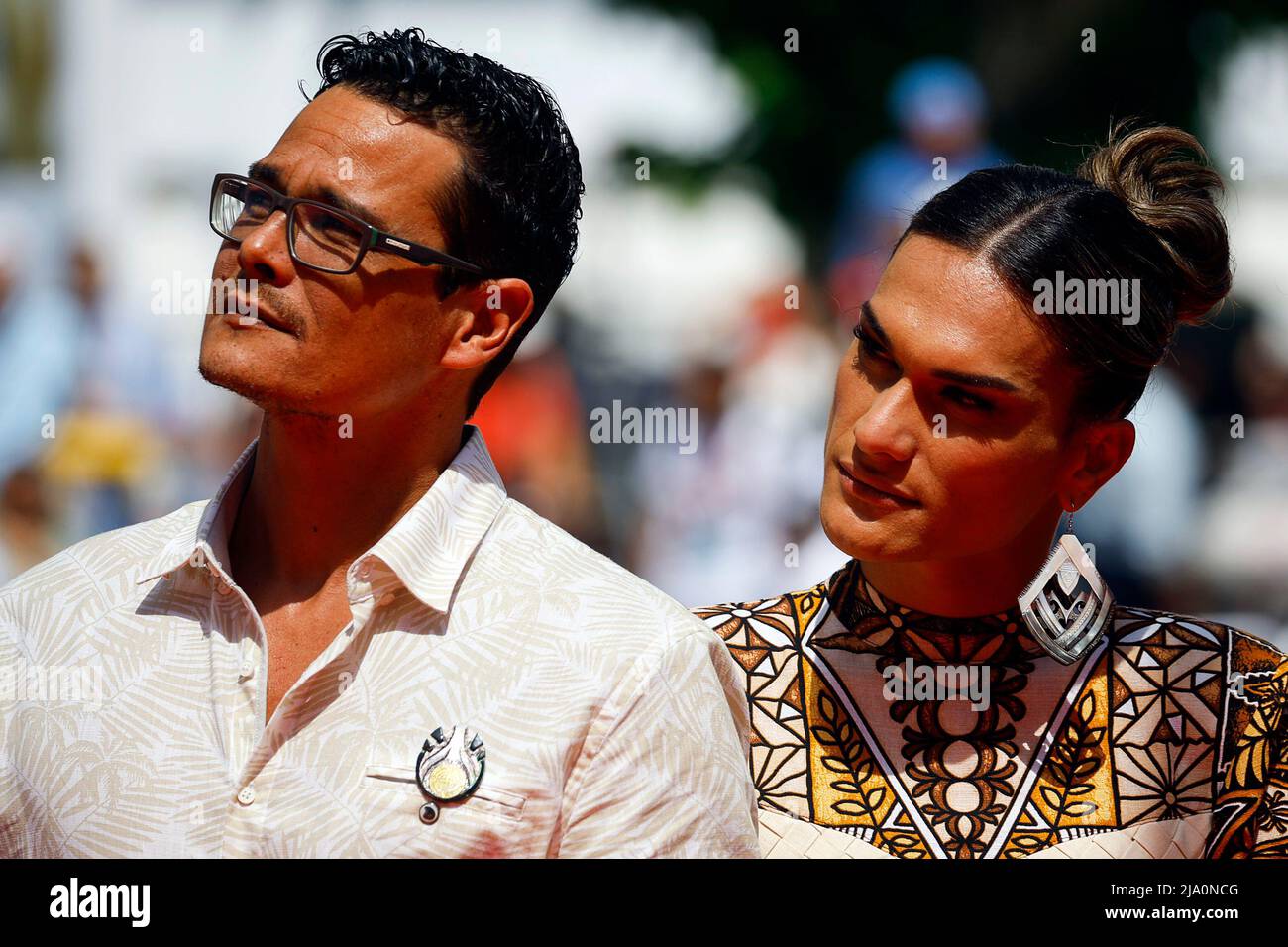 The 75th Cannes Film Festival - Screening of the film 'Tourment sur les iles' (Pacifiction) in competition - Red Carpet Arrivals - Cannes, France, May 26, 2022. Cast members Matahi Pambrun and Pahoa Mahagafanau pose. REUTERS/Stephane Mahe Stock Photo