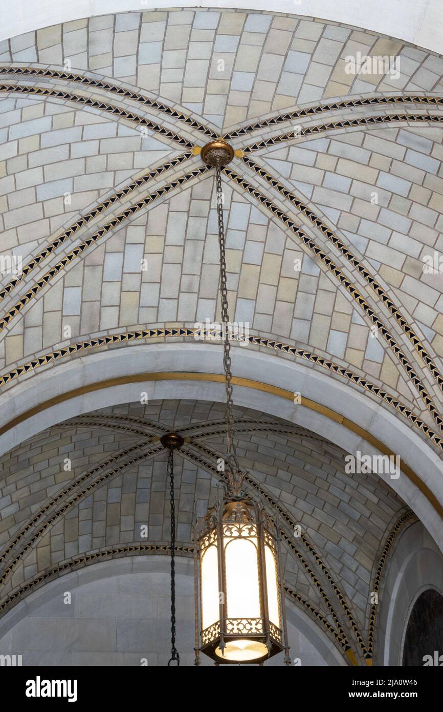 The Salmon Tower entrance at 11 West 42nd Street has an arched tile ceiling with decorative hanging lamps, Midtown Manhattan, New York City, USA  2022 Stock Photo