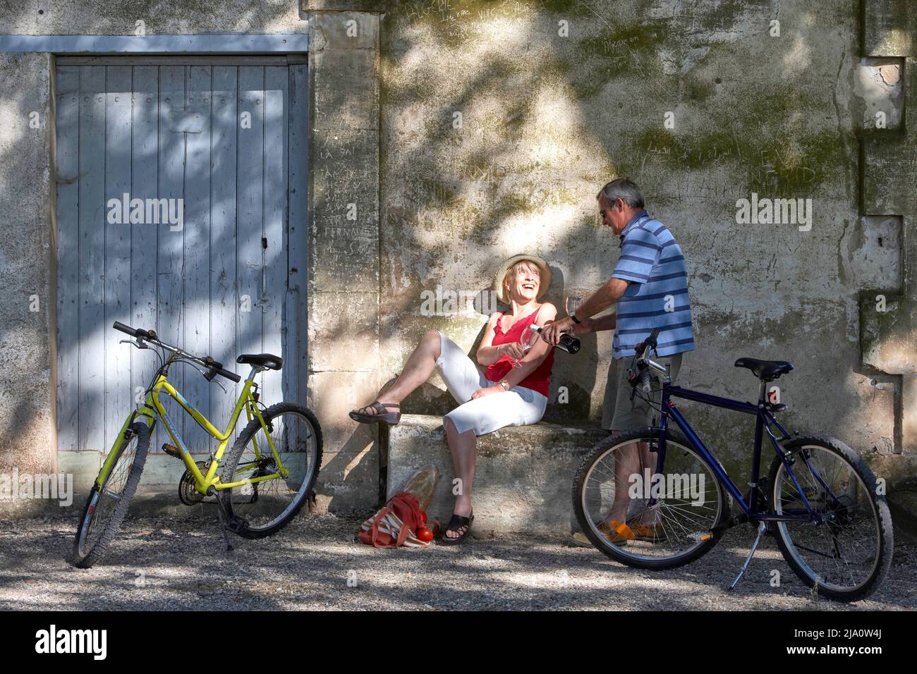 CYCLING COUPLE FRANCE RELAXING Stock Photo