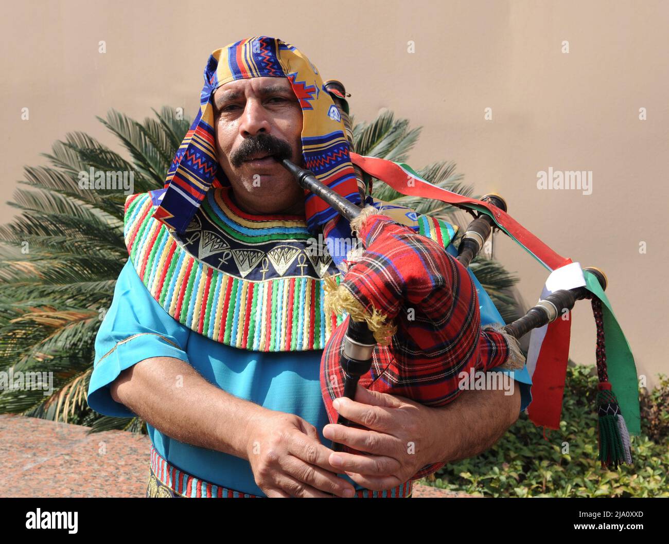 A Musician in Traditional Costume Playing Bagpipes in Cairo, Egypt