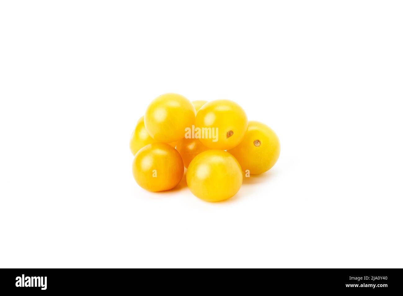 Group of yellow cherry tomatoes on a white background. Healthy food Stock Photo