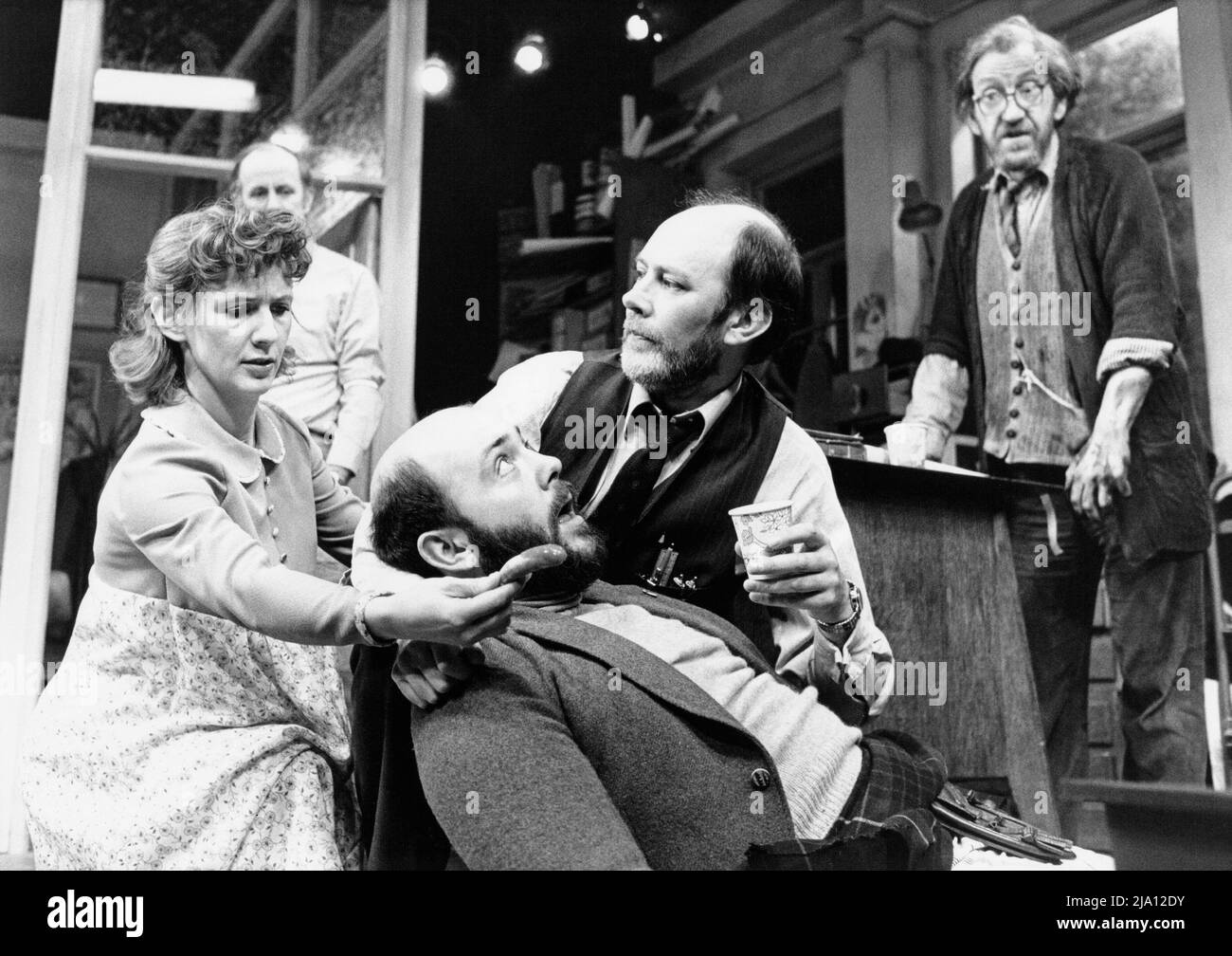 front, l-r: Virginia Stark, Nick Stringer, Garfield Morgan in NORMAL SERVICE by John Byrne at the Hampstead Theatre, London NW3  13/03/1979 set design: Sue Plummer  costumes: Lindy Hemming  director: Alan Dossor Stock Photo