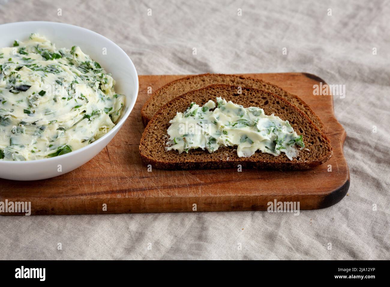Homemade Herb Butter with Rosemary and Parsley, side view Stock Photo