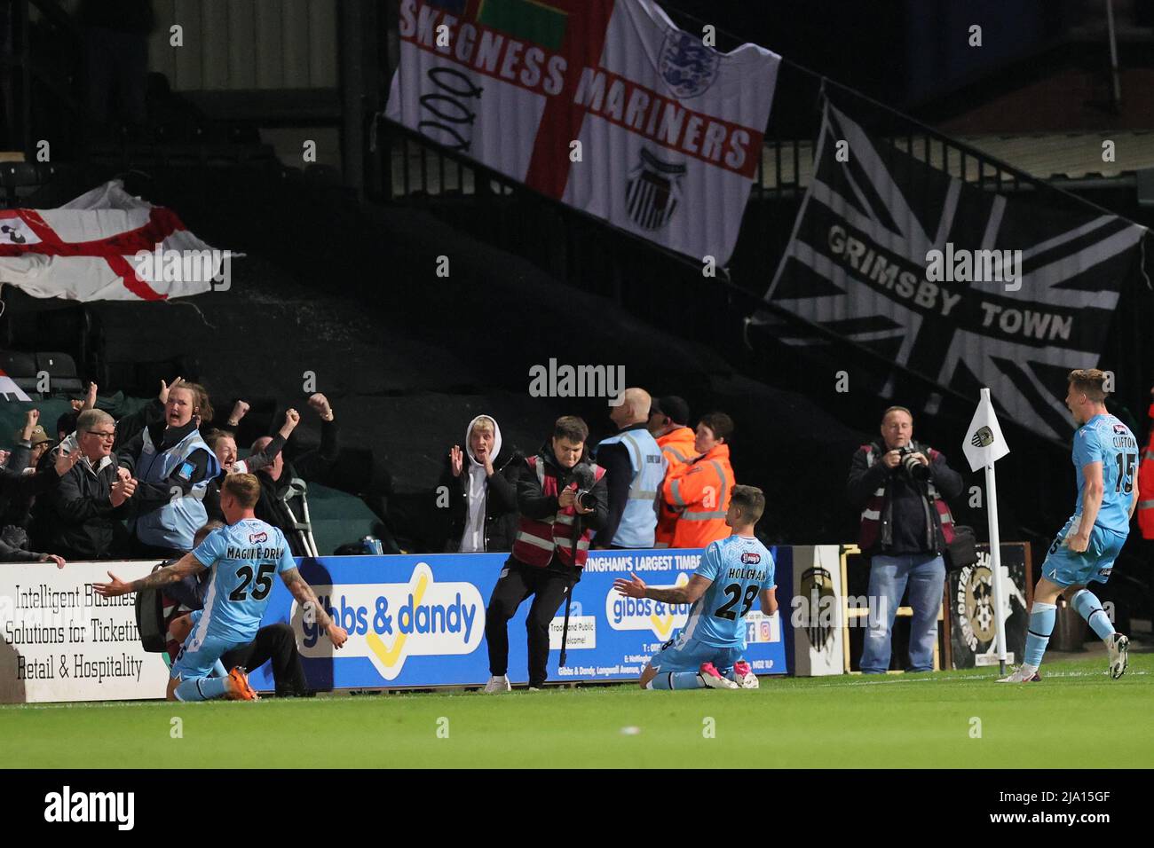 NOTTINGHAM, ENGLAND. MAY 23RD 2022. Gavan Holohan of Grimsby Town (centre) celebrates after scoring their sides opening goal to force extra time durin Stock Photo