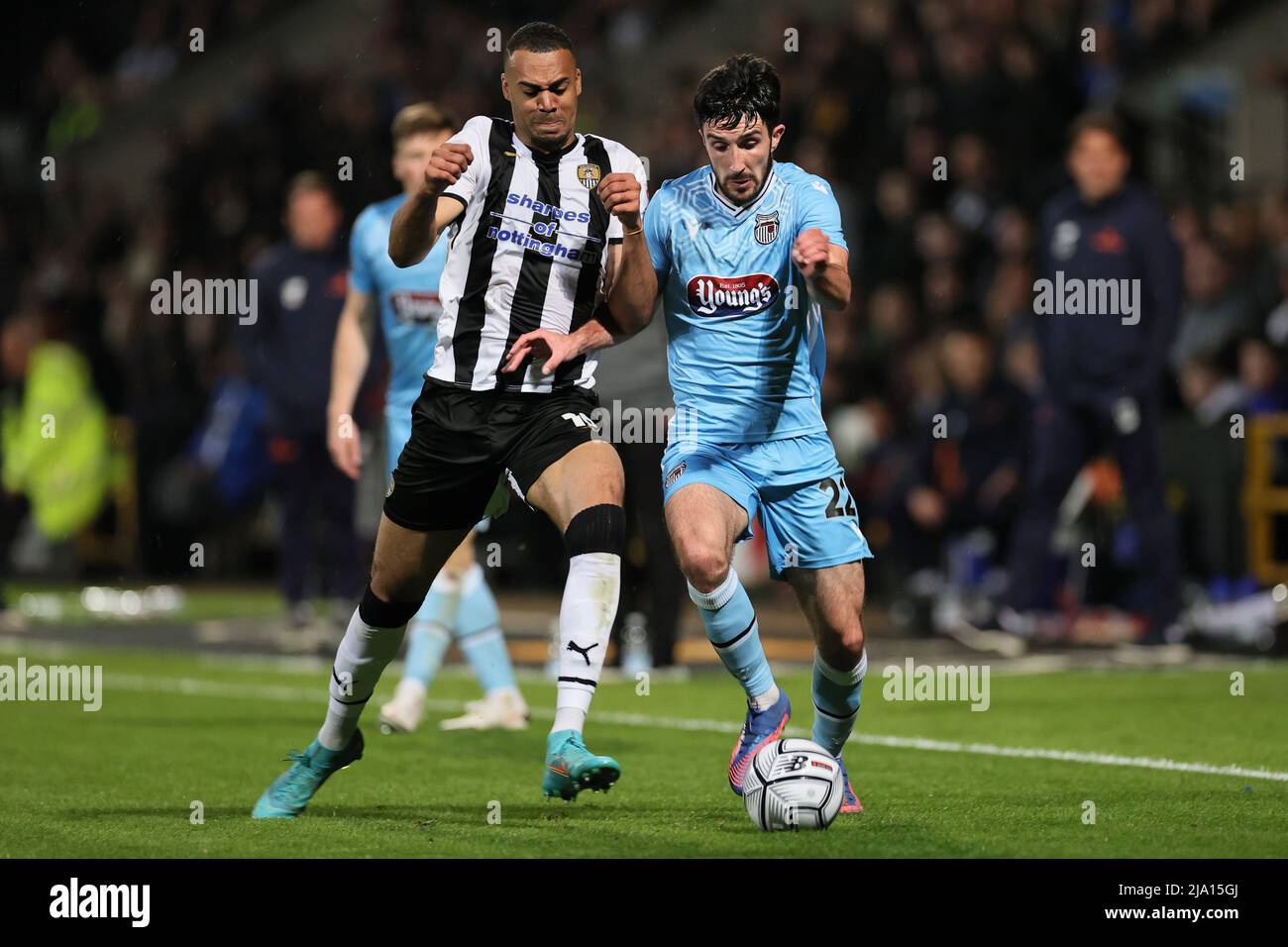 NOTTINGHAM, ENGLAND. MAY 23RD 2022. Danny Amos of Grimsby Town and Elisha Sam of Notts County battle for possession during the Vanarama National Leagu Stock Photo