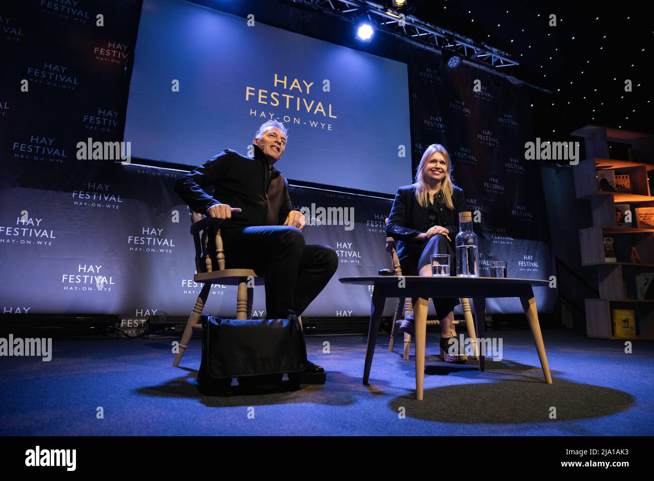 Hay-on-Wye, Wales, UK. 26th May, 2022. Jenny Packham talks to brother and naturalist Chris Packham about How to Make a Dress: Adventures in the Art of Style at Hay Festival 2022, Wales. Credit: Sam Hardwick/Alamy. Stock Photo