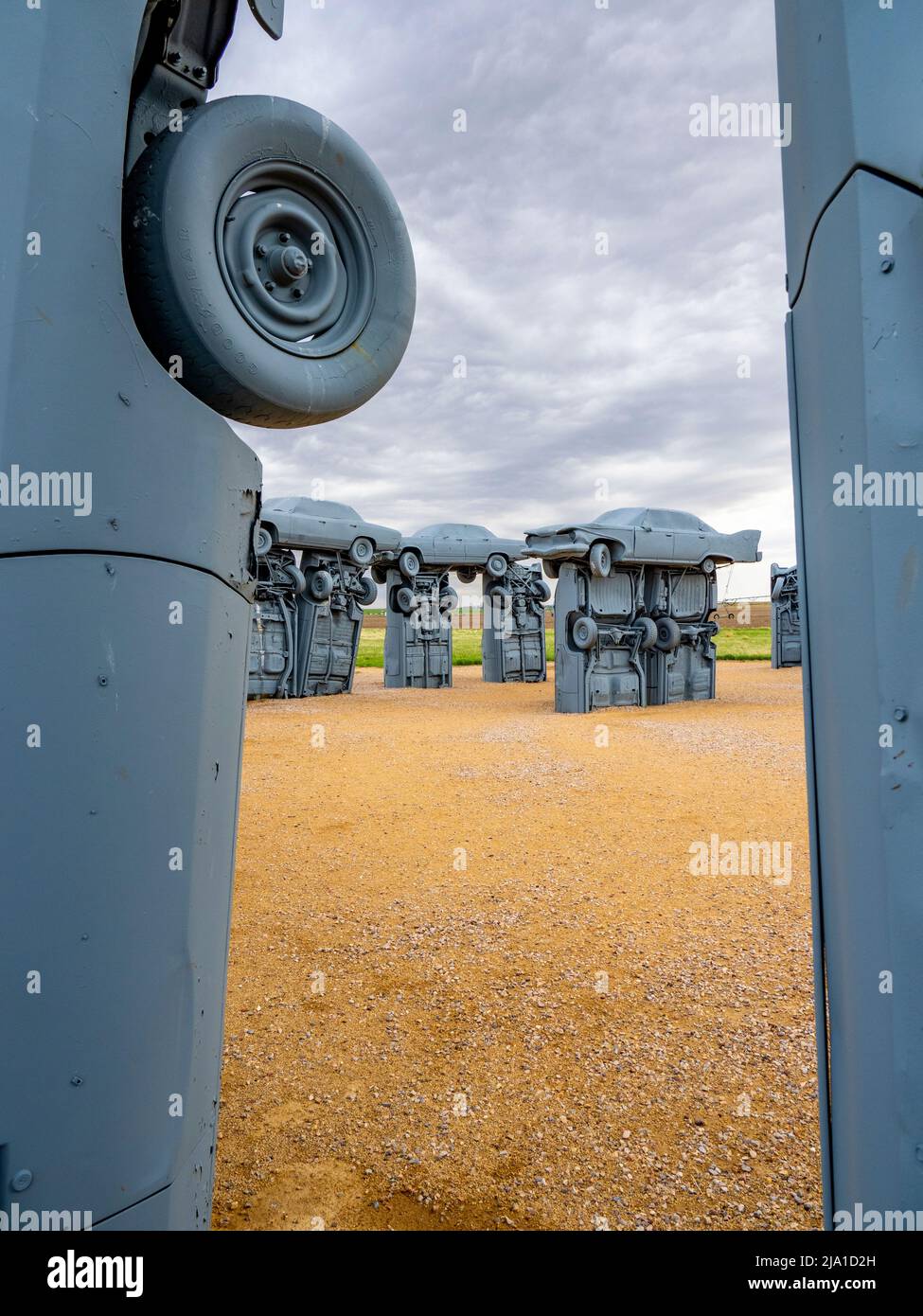 Carhenge is a  replica of Stonehenge in England that is created from old automobiles by Jim Reindersin in Alliance Nebraska USA Stock Photo