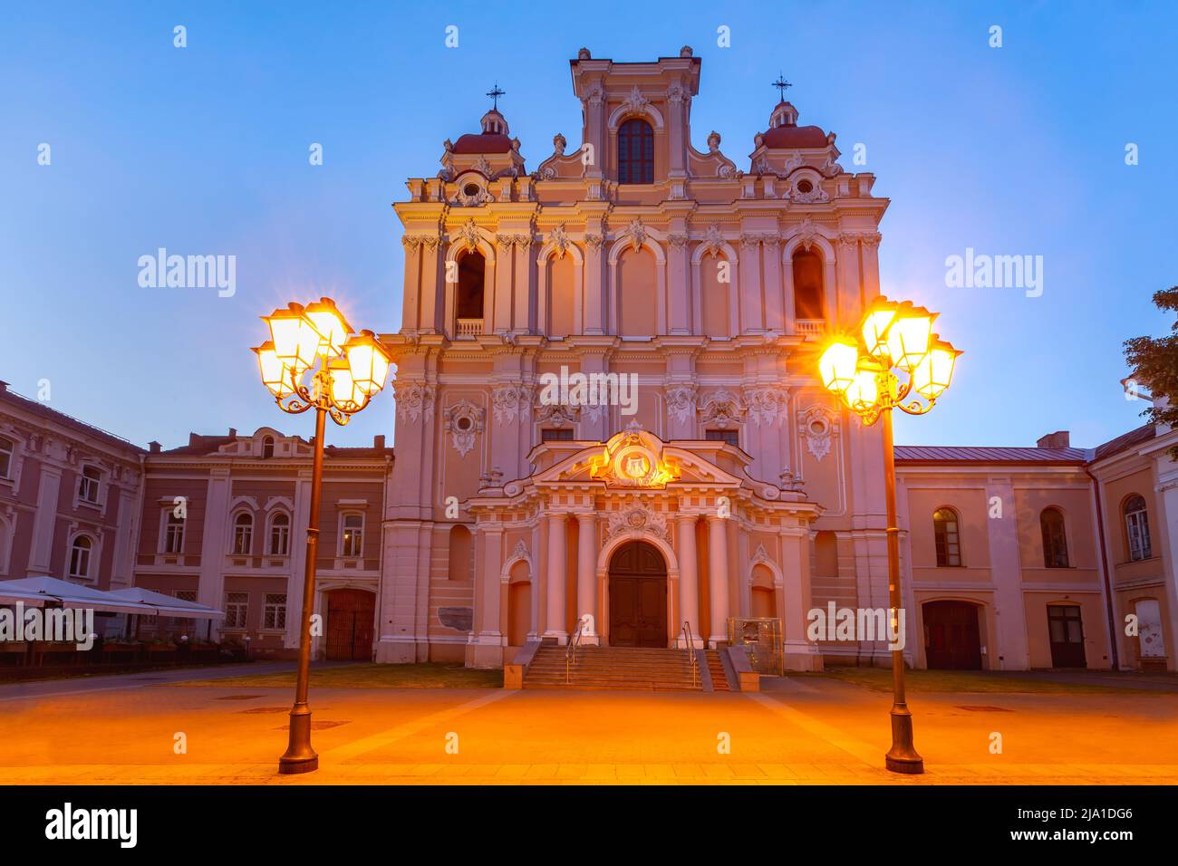 Facade of Saint Casimir church during morning blue hour in Vilnius