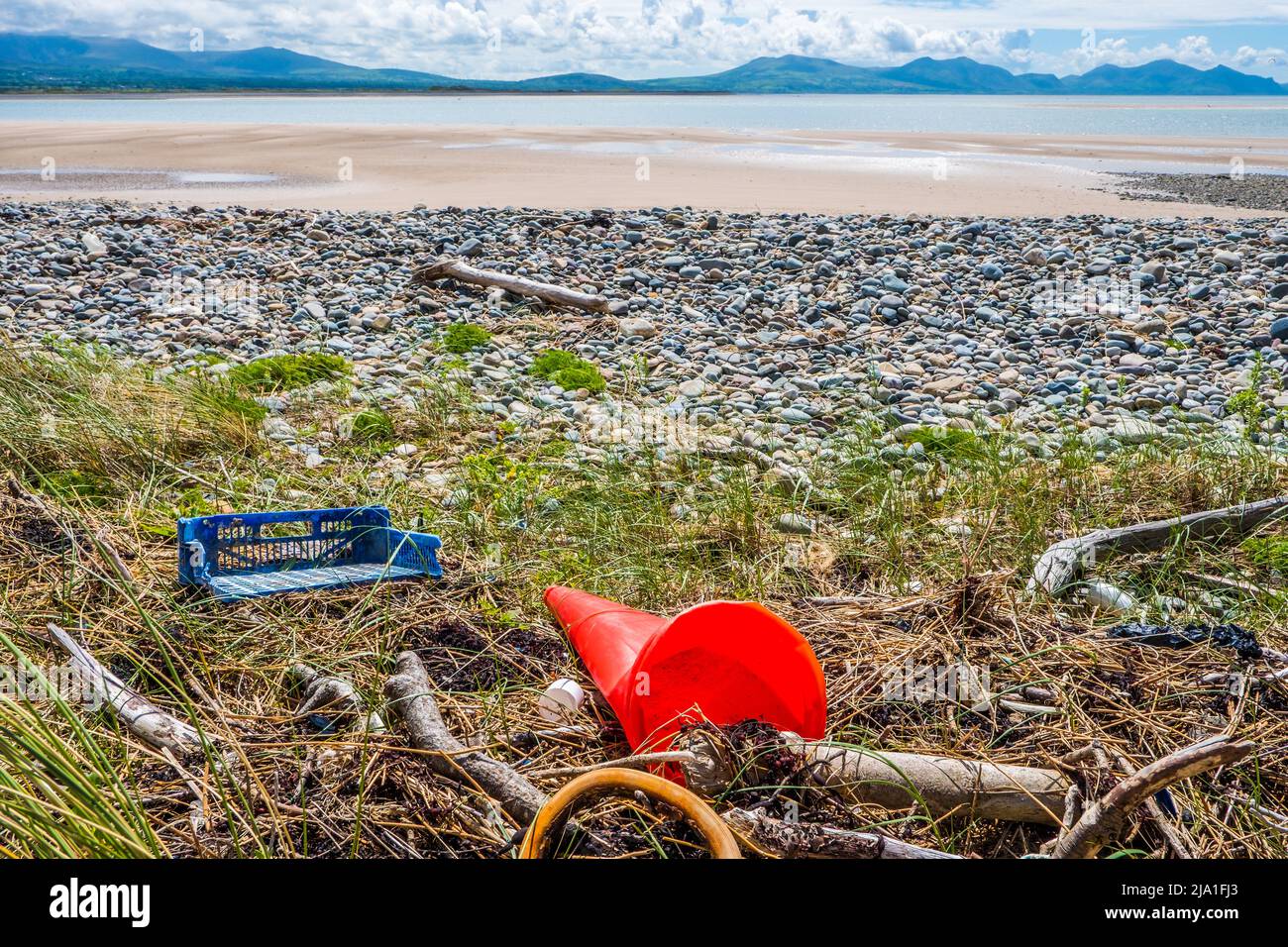 Plastic waste washed up on the beach at Newborough, Anglesey, Wales Stock Photo