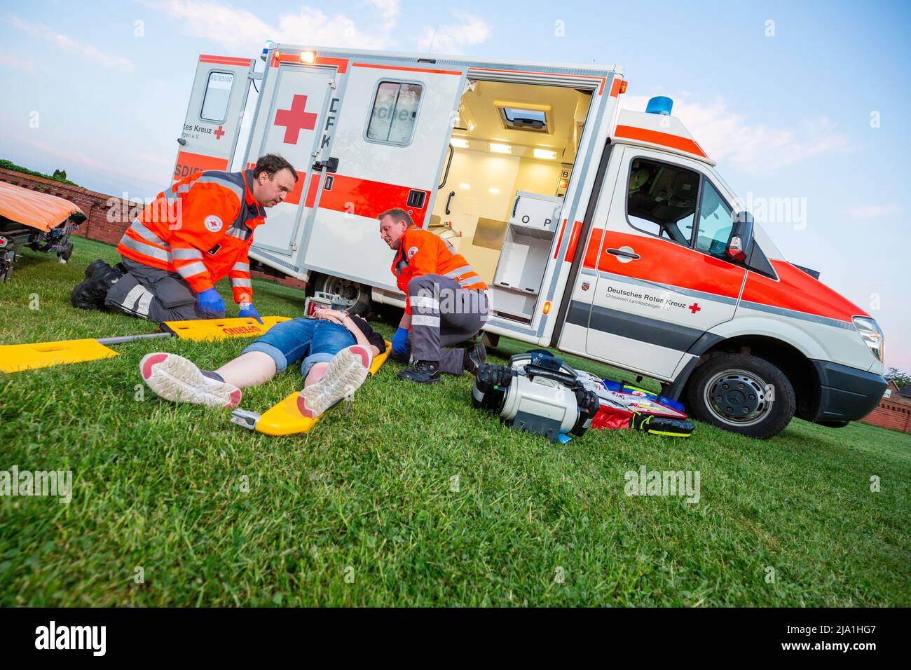 Landesbergen, Germany. May 11, 2022: German Paramedics from Deutsches Rotes Kreuz, works at an emergency site. Deutsches Rotes Kreuz is the national R Stock Photo