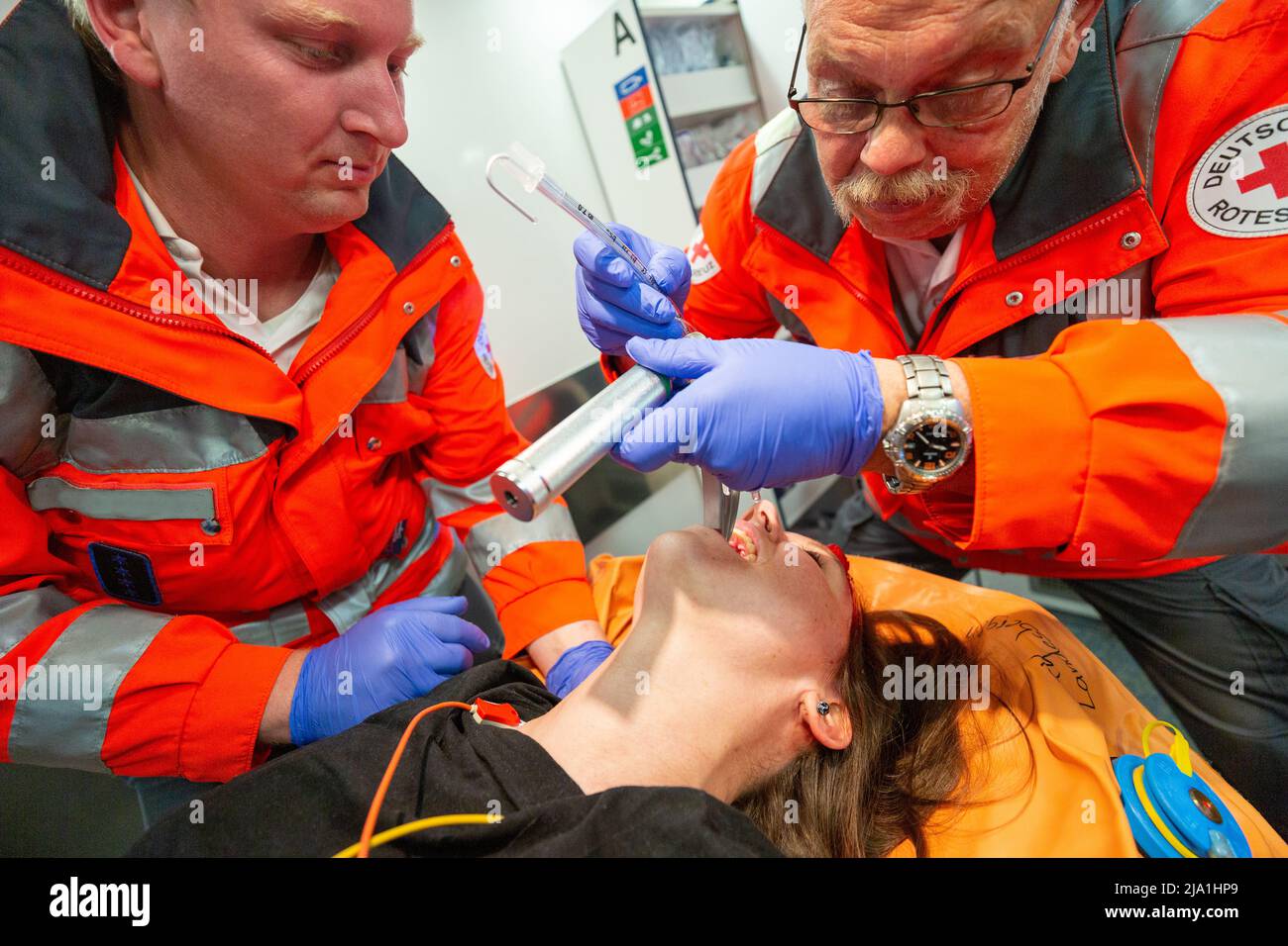 Landesbergen, Germany. May 11, 2022: German Paramedics from Deutsches Rotes Kreuz, works at an emergency site. Deutsches Rotes Kreuz is the national R Stock Photo