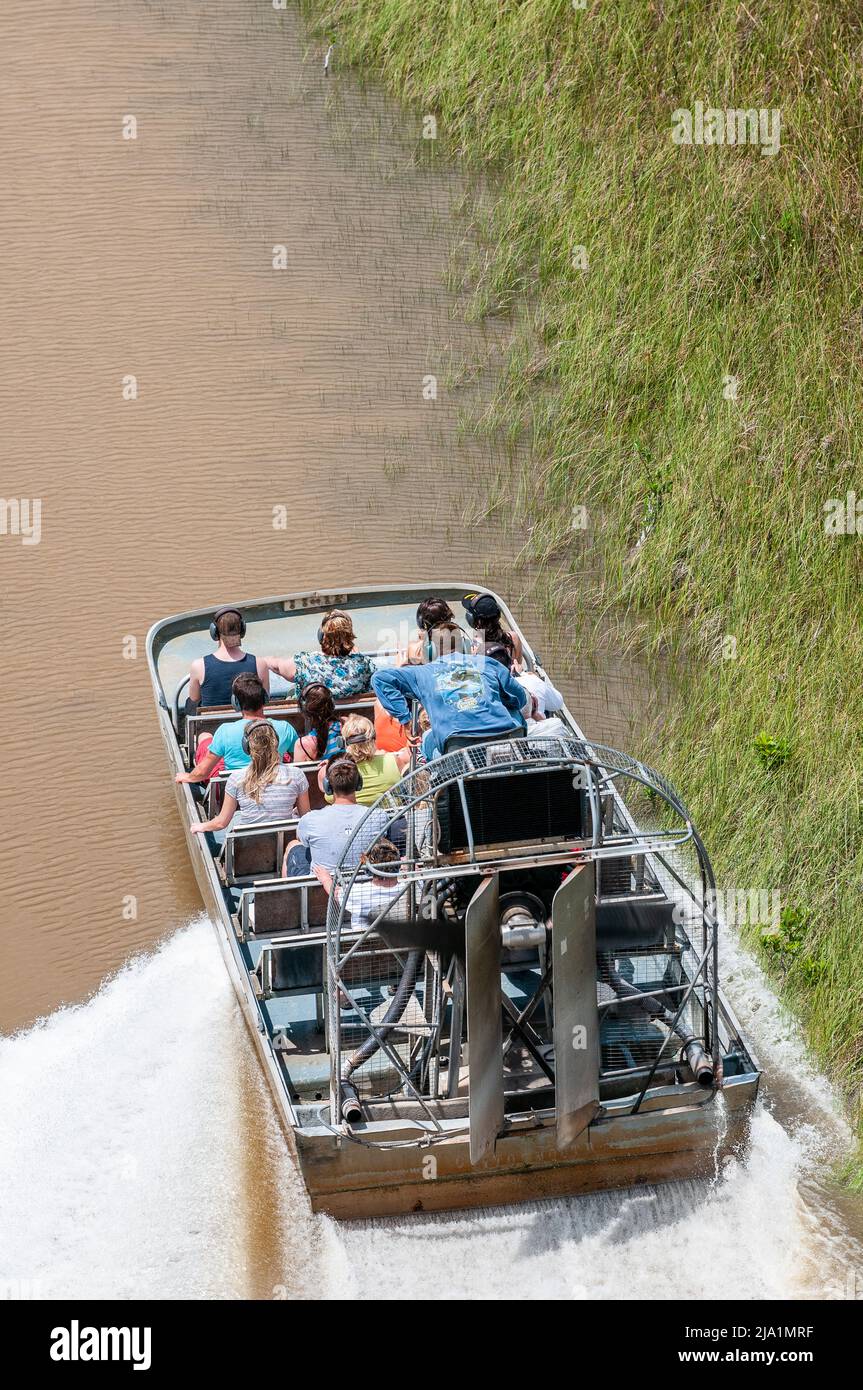 Stock images of Everglades National Park, Florida - Airboats flying over the Everglades National Park. Everglades Airboat Tours Glide and Guide Throug Stock Photo