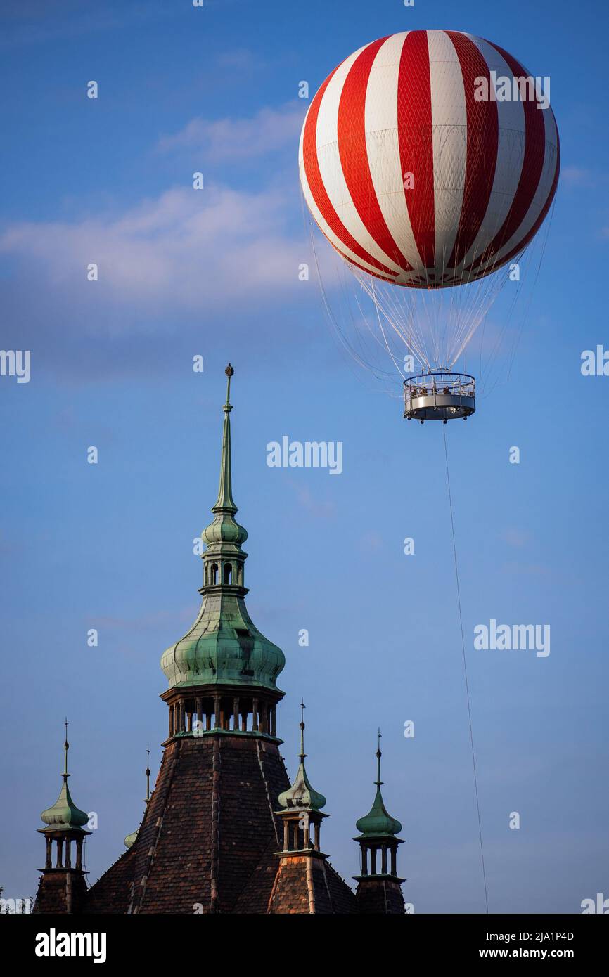 Striped hot air balloon flying next to a castle tower in Budapest City Park  Stock Photo - Alamy