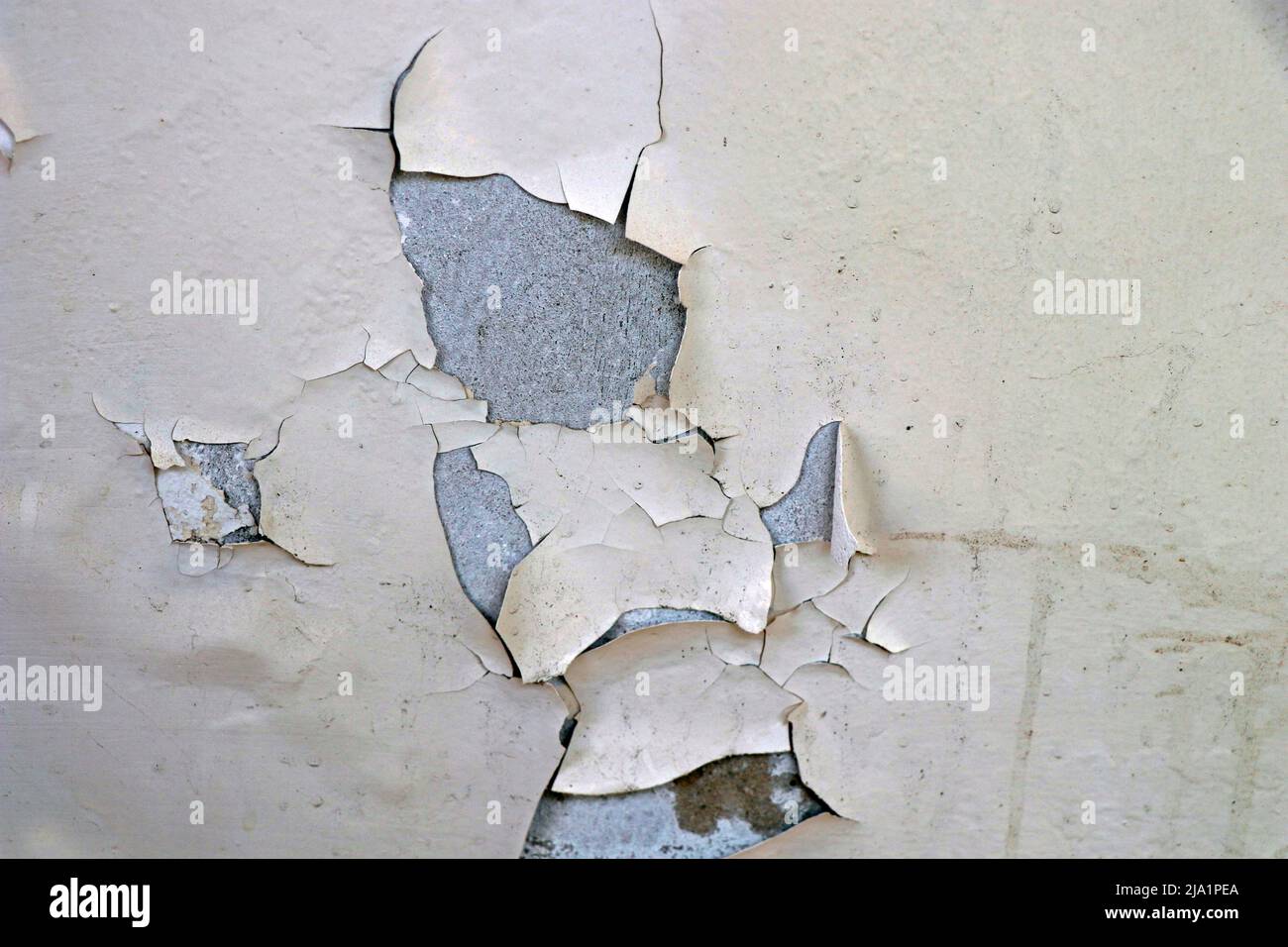wall paint damage due to moisture in close up Stock Photo - Alamy