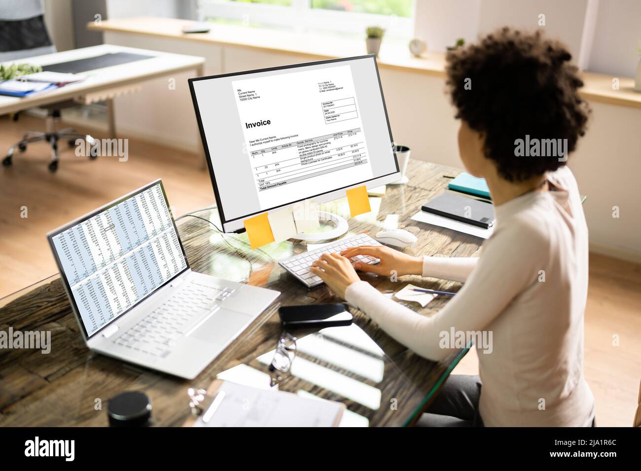 Accountant Using E Invoice Software At Computer In Office Stock Photo ...