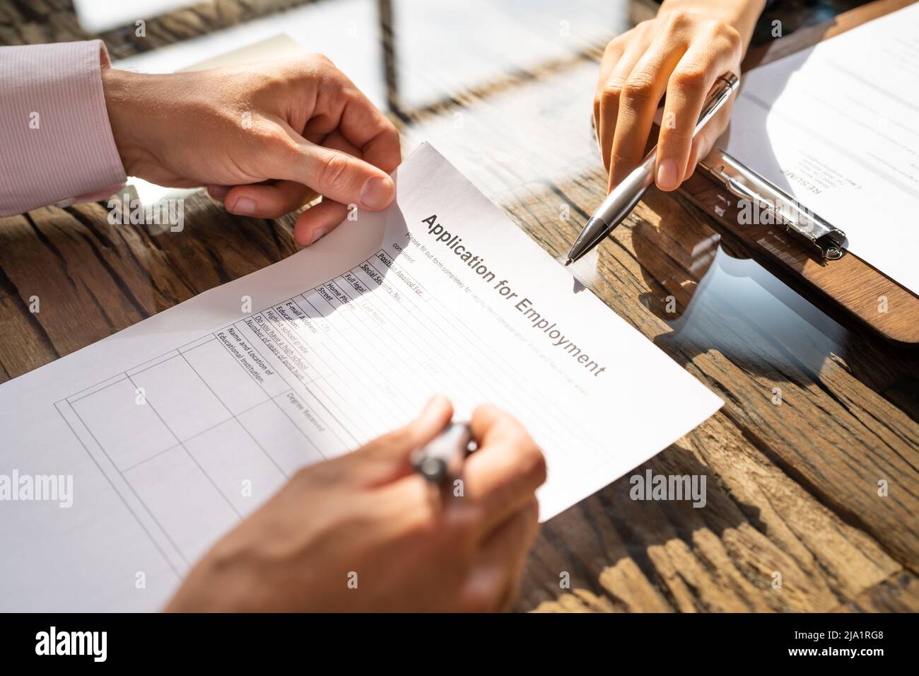 Job Interview And Unemployment. Hire Applicant. Application Form Stock Photo