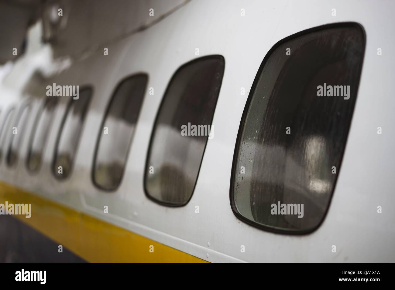 Airplane windows from the outside, at the airport Stock Photo Alamy
