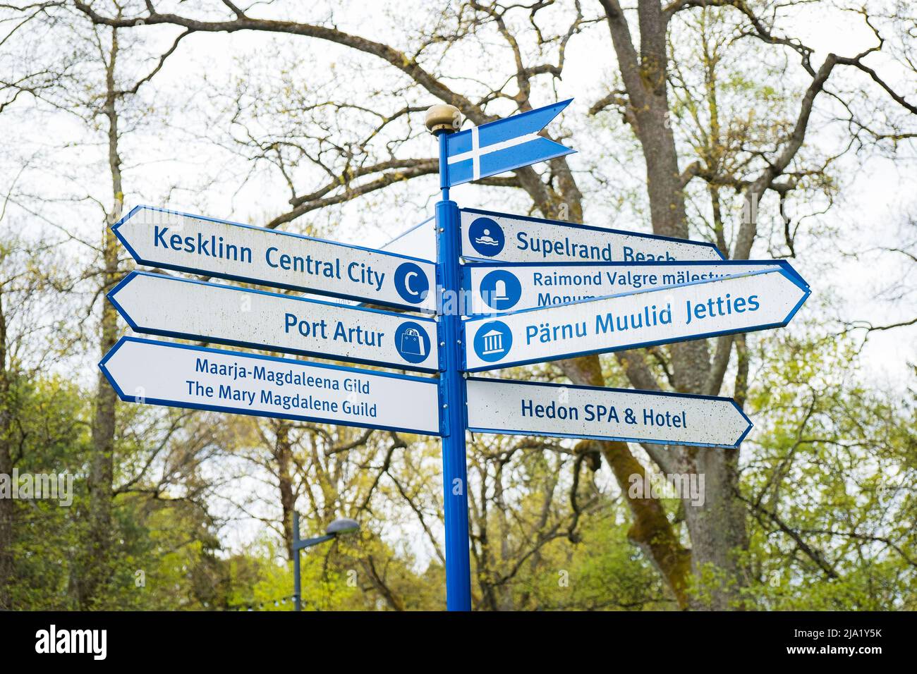 Signpost for Pärnu visitors. Sign pointing to different sights and tourist attractions in Pärnu, Estonia. Stock Photo