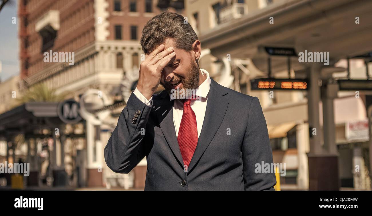stressed businessman. mature businessperson in formalwear. business failure. Stock Photo