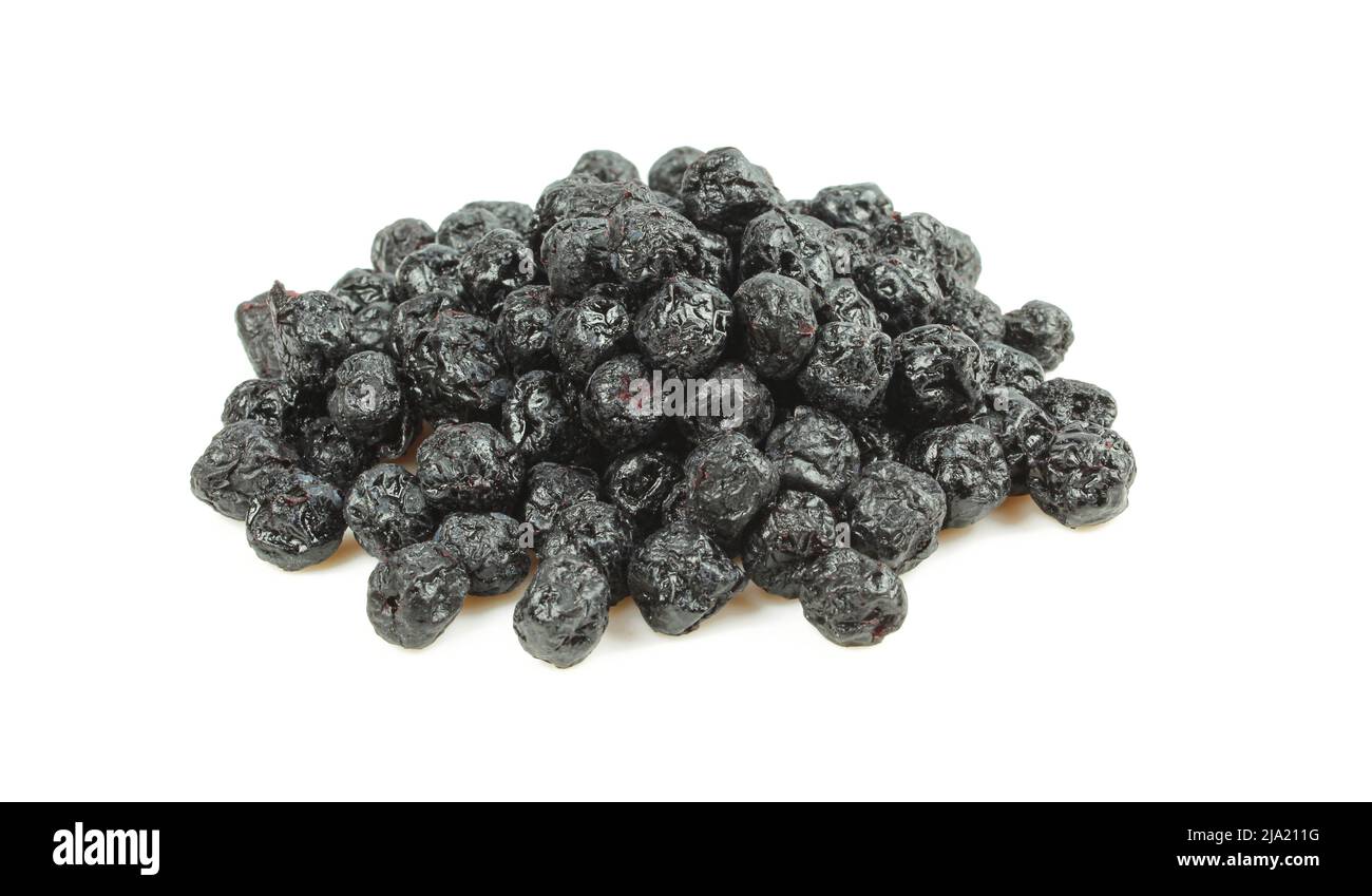Pile of candied dry chokeberries isolated on white background. Dried ...