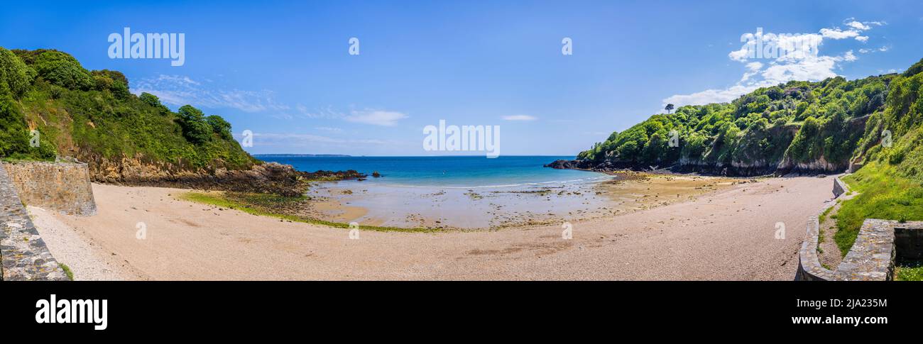 Panoramic view over Fermain Bay at low tide near St Peter Port on the east coast of the Bailiwick of Guernsey, Channel Islands, UK on  a sunny day Stock Photo