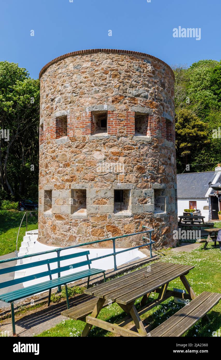 Fermain Tower no. 15, a defensive loophole tower in Fermain Bay near St Peter Port, east coast of the Bailiwick of Guernsey, Channel Islands, UK Stock Photo