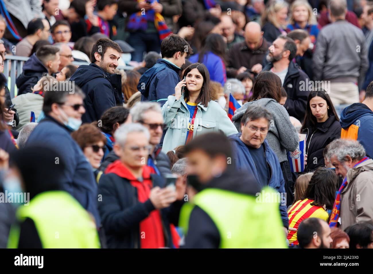 BARCELONA - APR 22: Fans cheering from the stands during the UEFA Women's Champions League match between FC Barcelona and VfL Wolfsburg at the Camp No Stock Photo