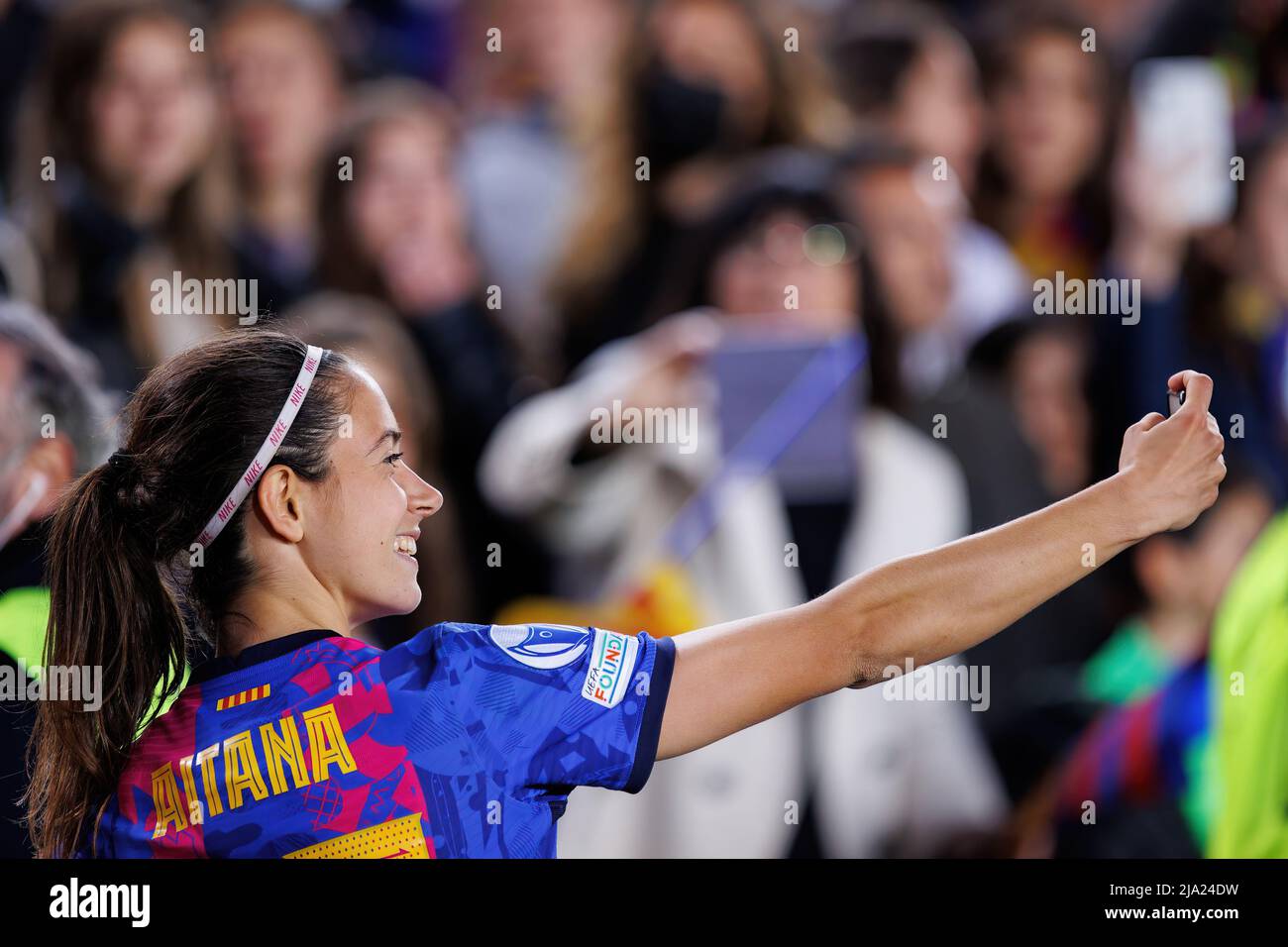 BARCELONA - APR 22: Aitana takes a selfie with the fans after the UEFA Women's Champions League match between FC Barcelona and VfL Wolfsburg at the Ca Stock Photo