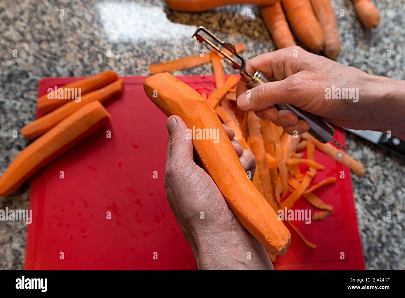 Peeling carrot peeler close up hi-res stock photography and images - Alamy