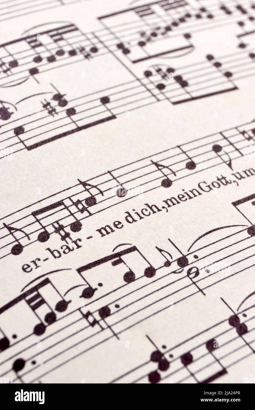 Closeup of the St Matthew Passion by Johann Sebastian Bach. Fragment of a partition with text Erbarme dich mein Gott Stock Photo