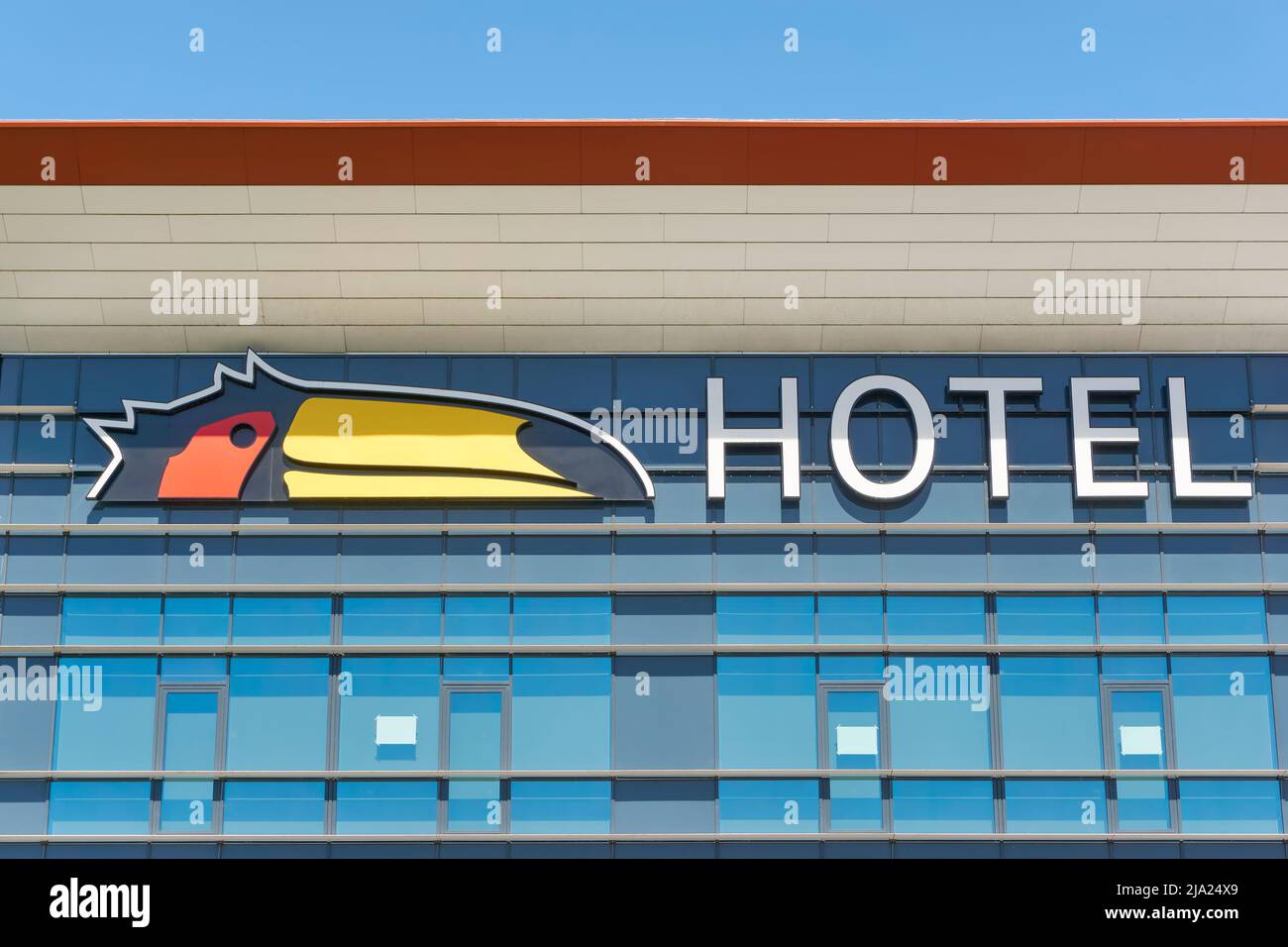 Logo on a Van der Valk hotel with its characteristic toucan. A Dutch  international hospitality chain run by the Van der Valk family Stock Photo  - Alamy