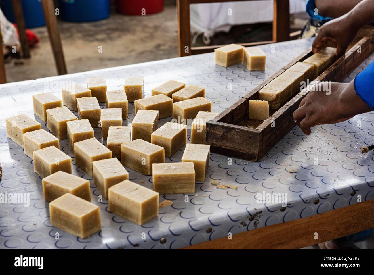 Soap, hands making soap at Seaweed centre, Women's Cooperative, seaweed