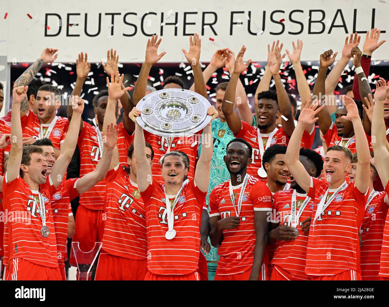 Championship celebration, handing over the trophy to Marcel Sabitzer, team photo FC Bayern FCB, Allianz Arena, Munich, Bavaria, Germany Stock Photo