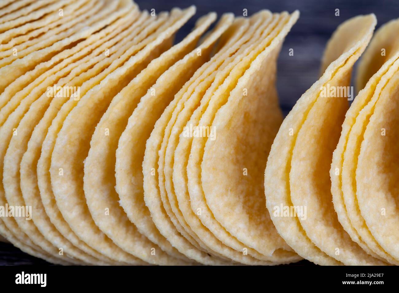 crispy potato chips with spices, some crispy natural potato chips