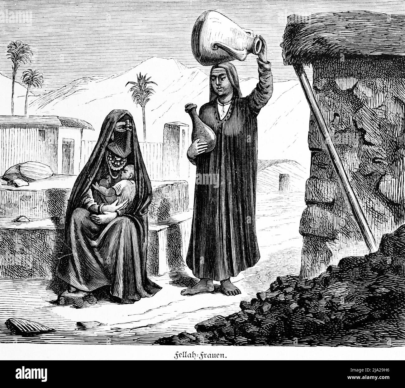 Fellah, Fulbe Frauen, baby, breastfeeding, village view, necklaces, veils, mountains, clay jug, sitting, huts, exterior view, palm trees, portrait Stock Photo