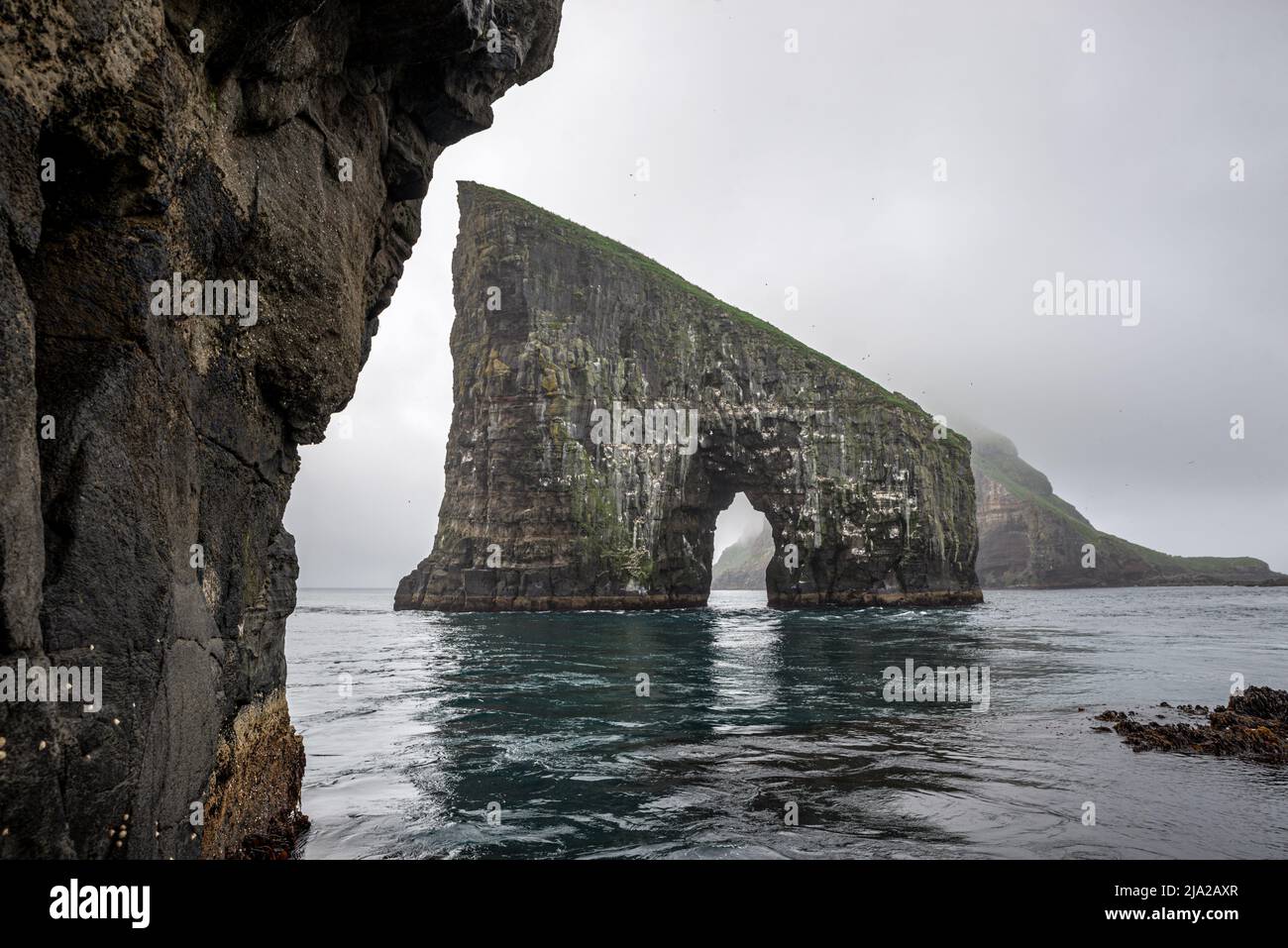 Drangarnir rock formation made by two sea stacks close to Vagar, Faroe ...