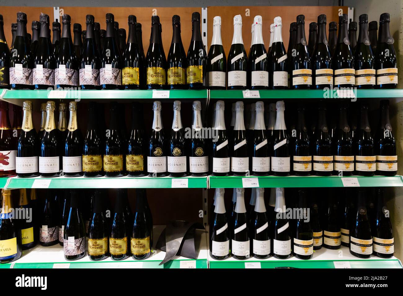 Cava bottles in wine store of Barcelona Stock Photo