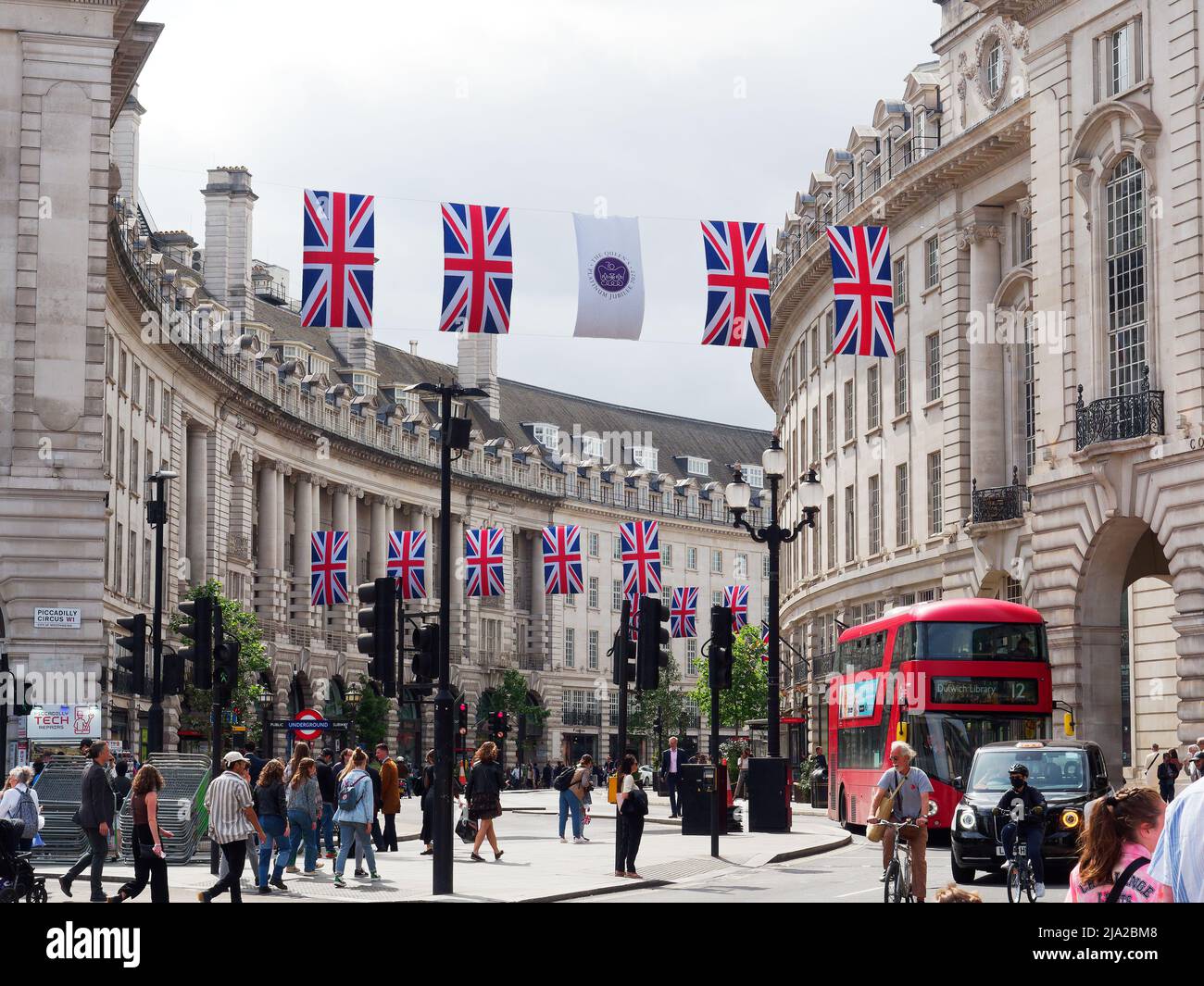 Union Jack flags hanging over Regent Street in London to celebrate the Queen’s Platinum Jubilee Stock Photo