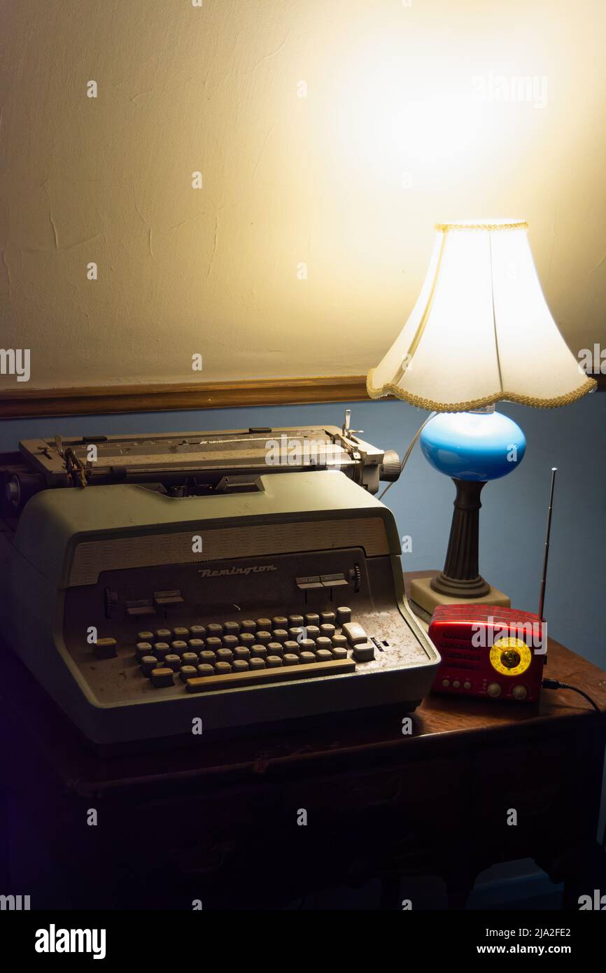Remington typewriter on desk next to vintage radio at the 1926 Medieval