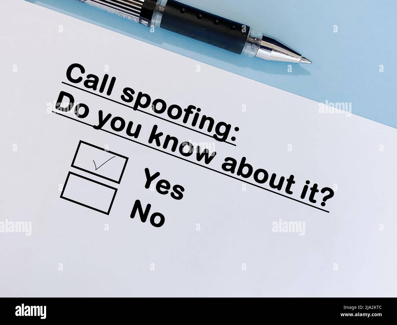 One person is answering question about scam and fraud. He knows about call spoofing. Stock Photo