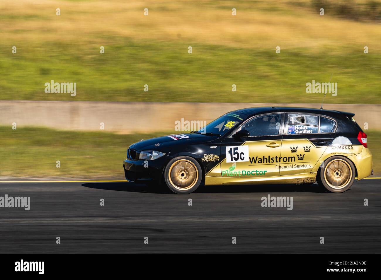 Sydney, Australia. 27 May, 2022. Chris Gunther driving his 2005 BMW 130i down towards turn 9, during practice 2 at Sydney Motorsport Park Stock Photo