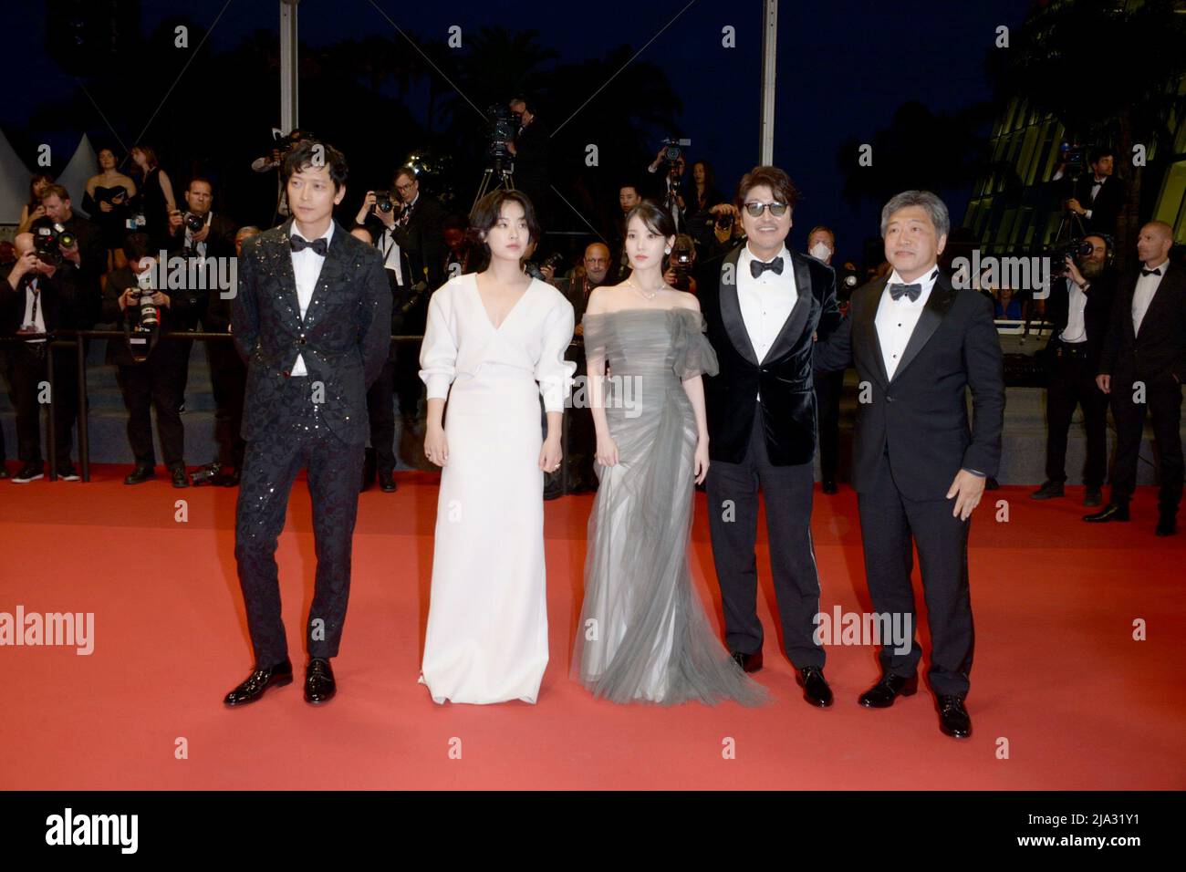 May 26, 2022, CANNES, France: CANNES, FRANCE - MAY 26: Song Kang-Ho, Director Hirokazu Koreeda, Hee-jin Choi, Joo-Young Lee and Dong-won Gang depart the screening of ''Broker (Les Bonnes Etoiles)'' during the 75th annual Cannes film festival at Palais des Festivals on May 26, 2022 in Cannes, France. (Credit Image: © Frederick Injimbert/ZUMA Press Wire) Stock Photo