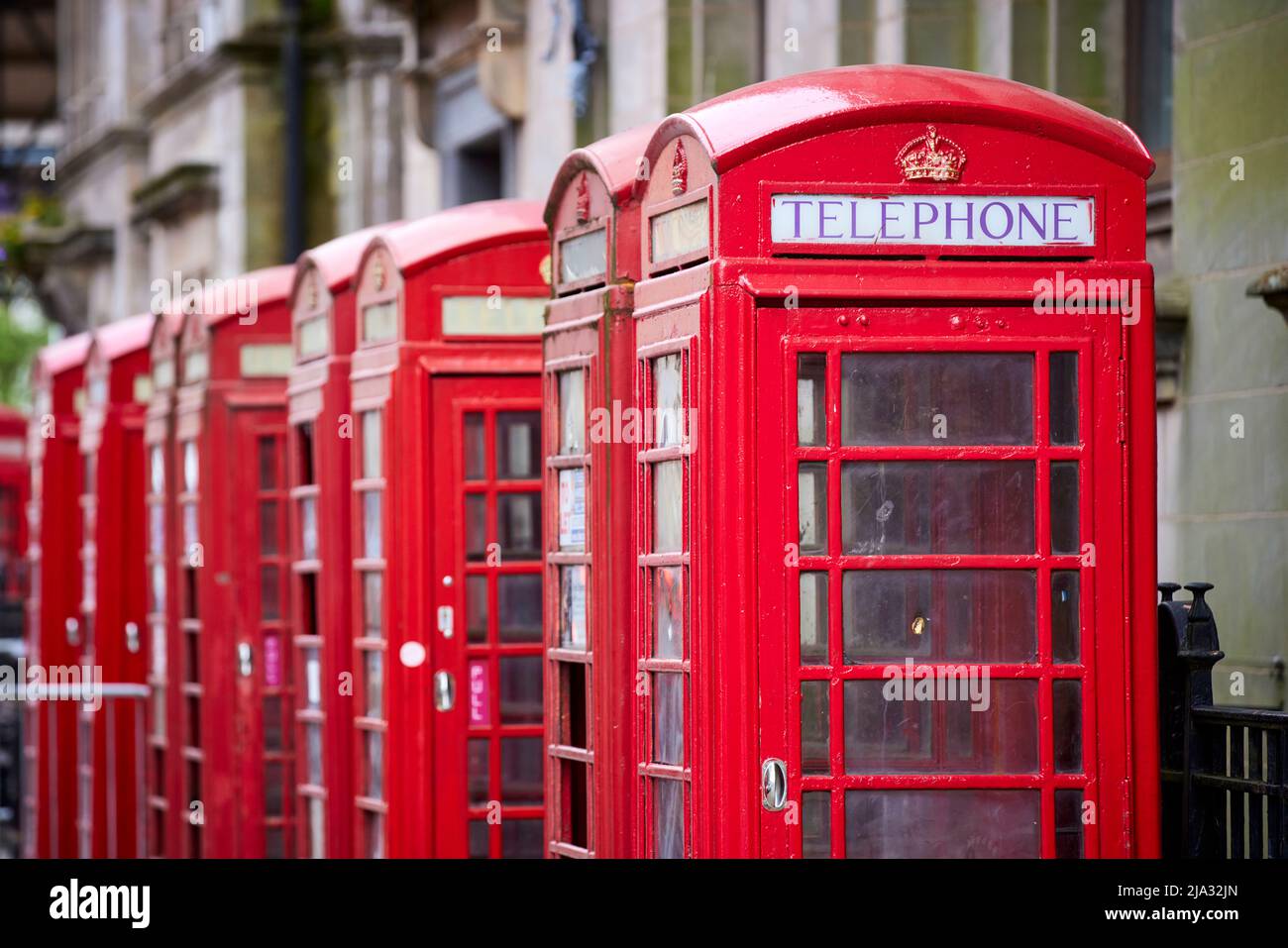 Preston in Lancashire,  Red telephone boxes in the City Centre Stock Photo