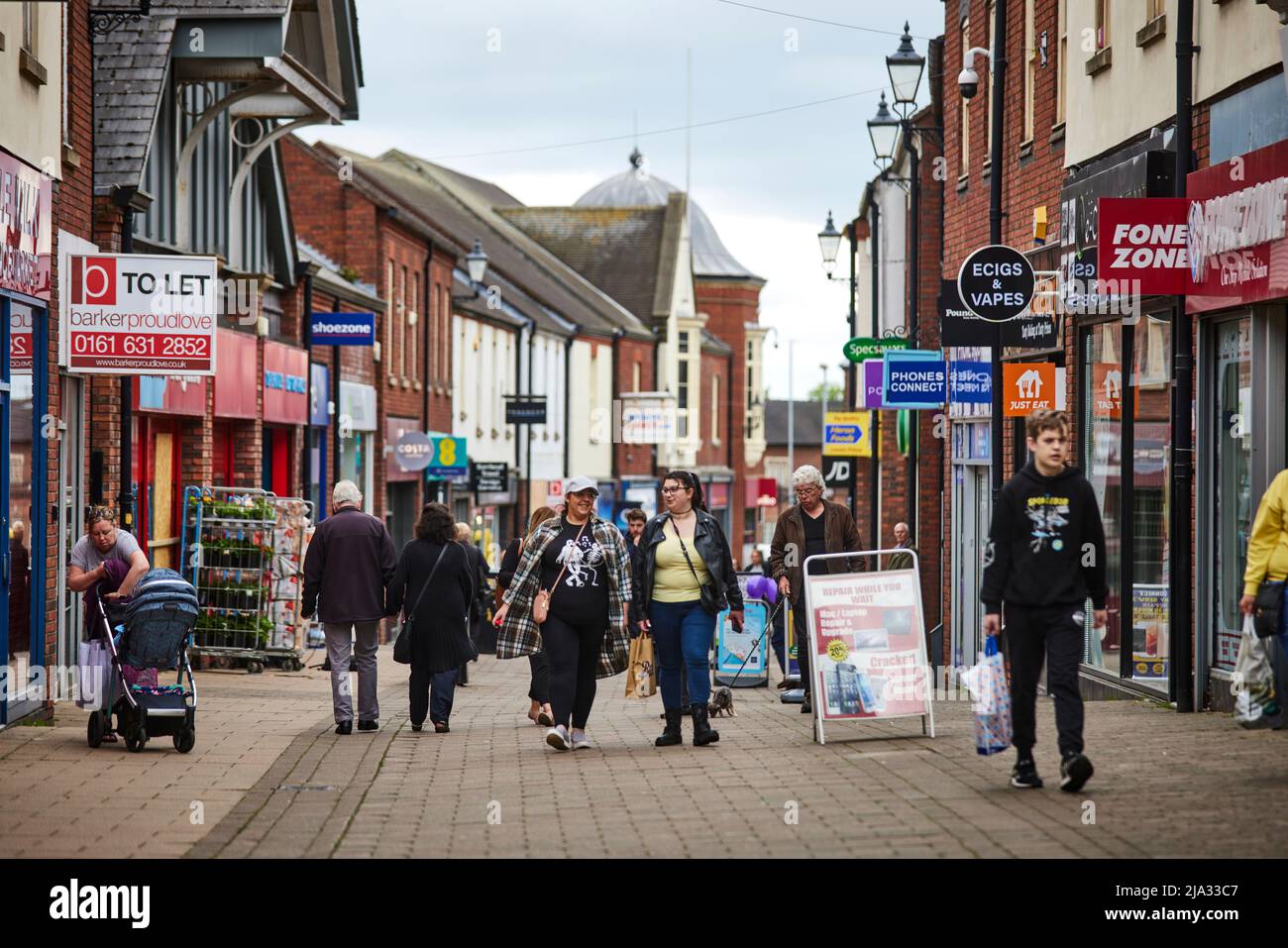 NewcastleunderLyme in Staffordshire, shoppers in the high street