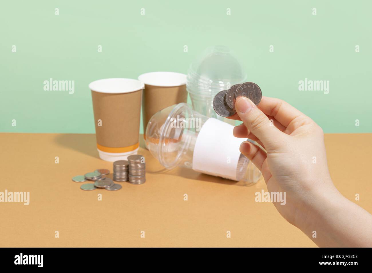 protect earth and environment concept, paper cup and plastic cup and ...