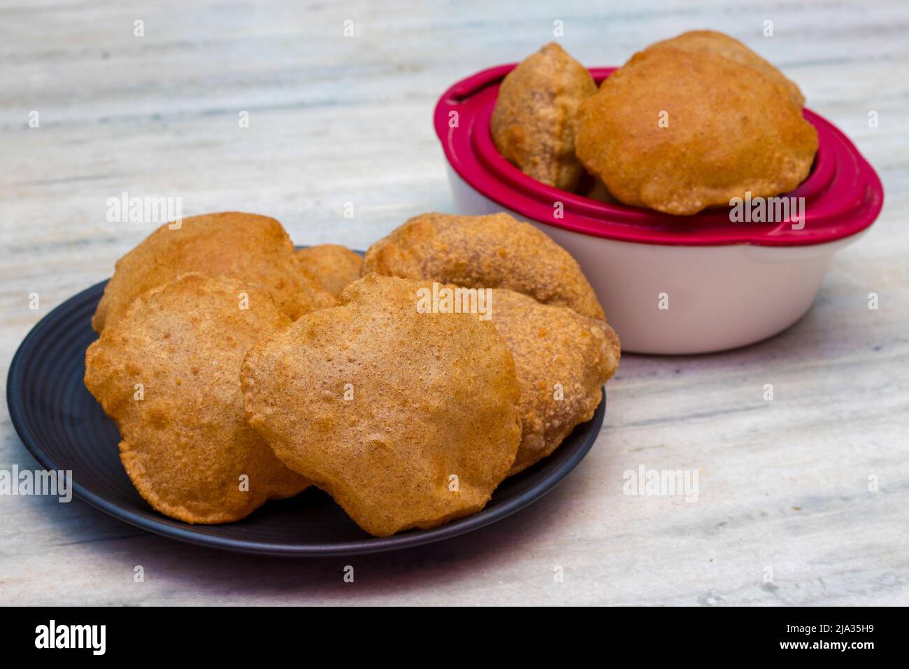 popular food in south Asian countries like India,Pakistan,Bangladesh 'puri' made of millet flour. Stock Photo