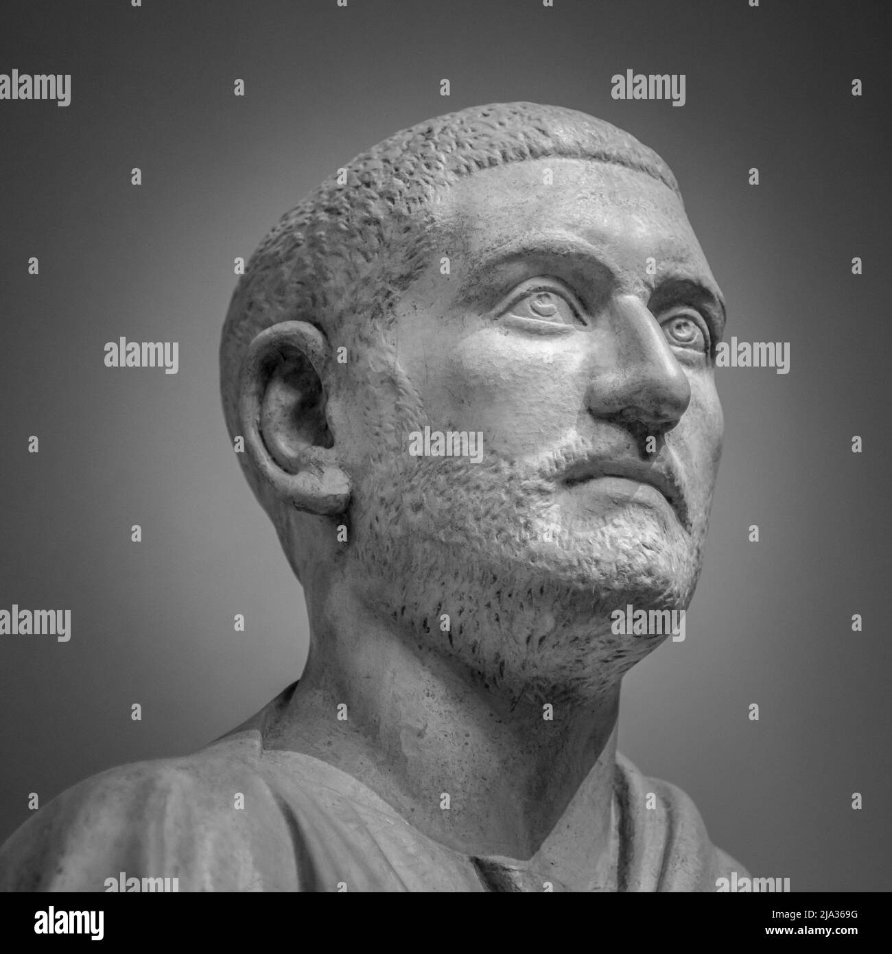 The ancient marble head of man sculpture. Stock Photo