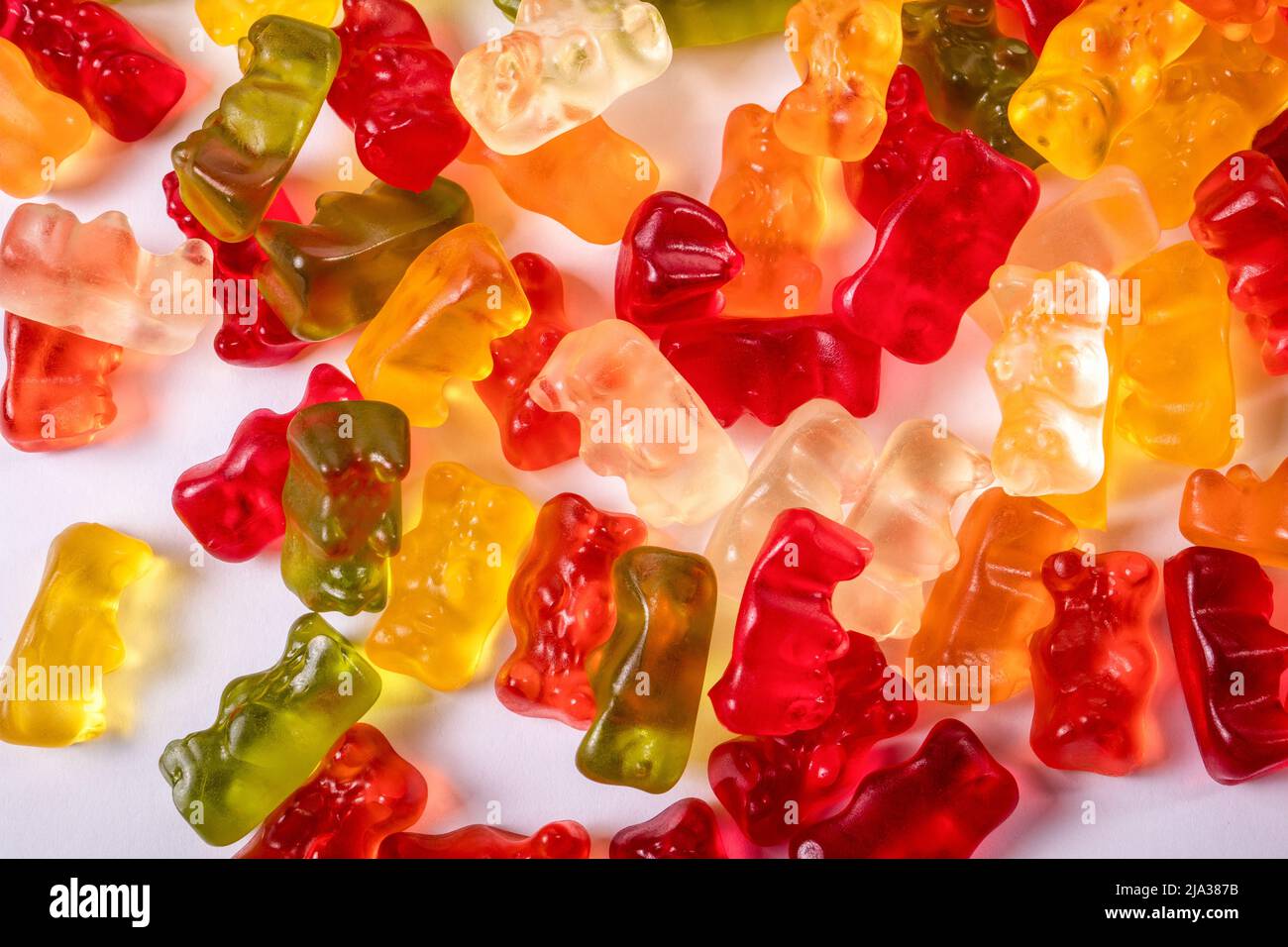 Stack of rubber bears on a white background. Stock Photo