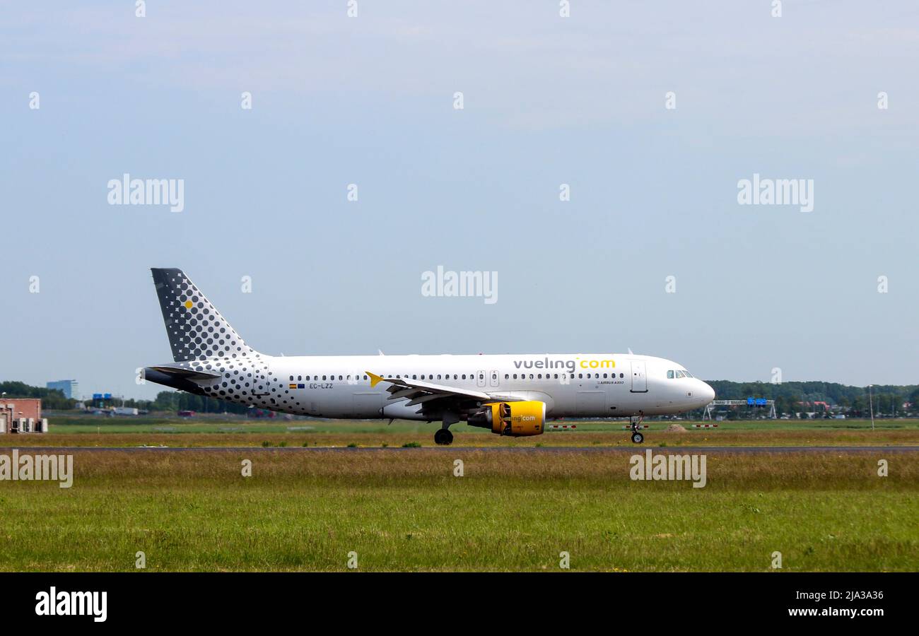 EC-LZZ Vueling Airbus A320-214 Aircraft landing at the Polderbaan 36L-18R at the Amsterdam Schiphol airport in the Netherlands Stock Photo